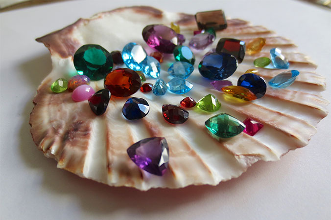 collection of gemstones on a shell