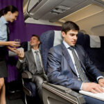 people business class airplane stewardess